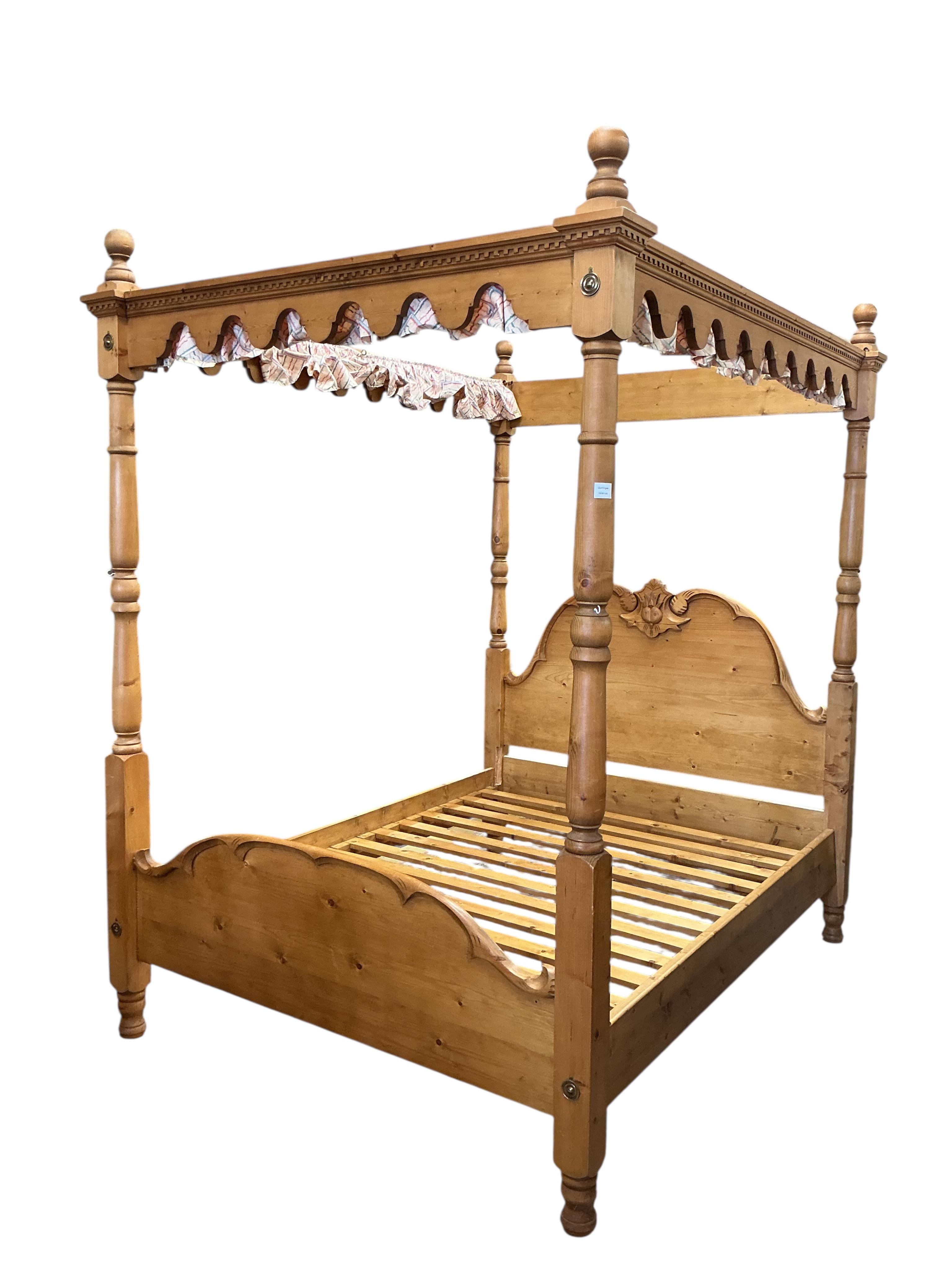 A Victorian style pine four poster double bed, length 212cm, width 166cm, height 240cm